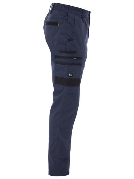 Navy blue work pants with black zippers and pockets on a white background